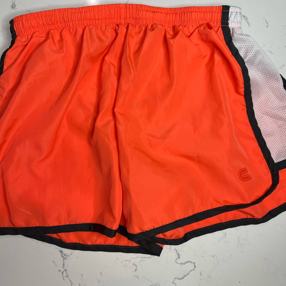 Size small orange black and white work out shorts